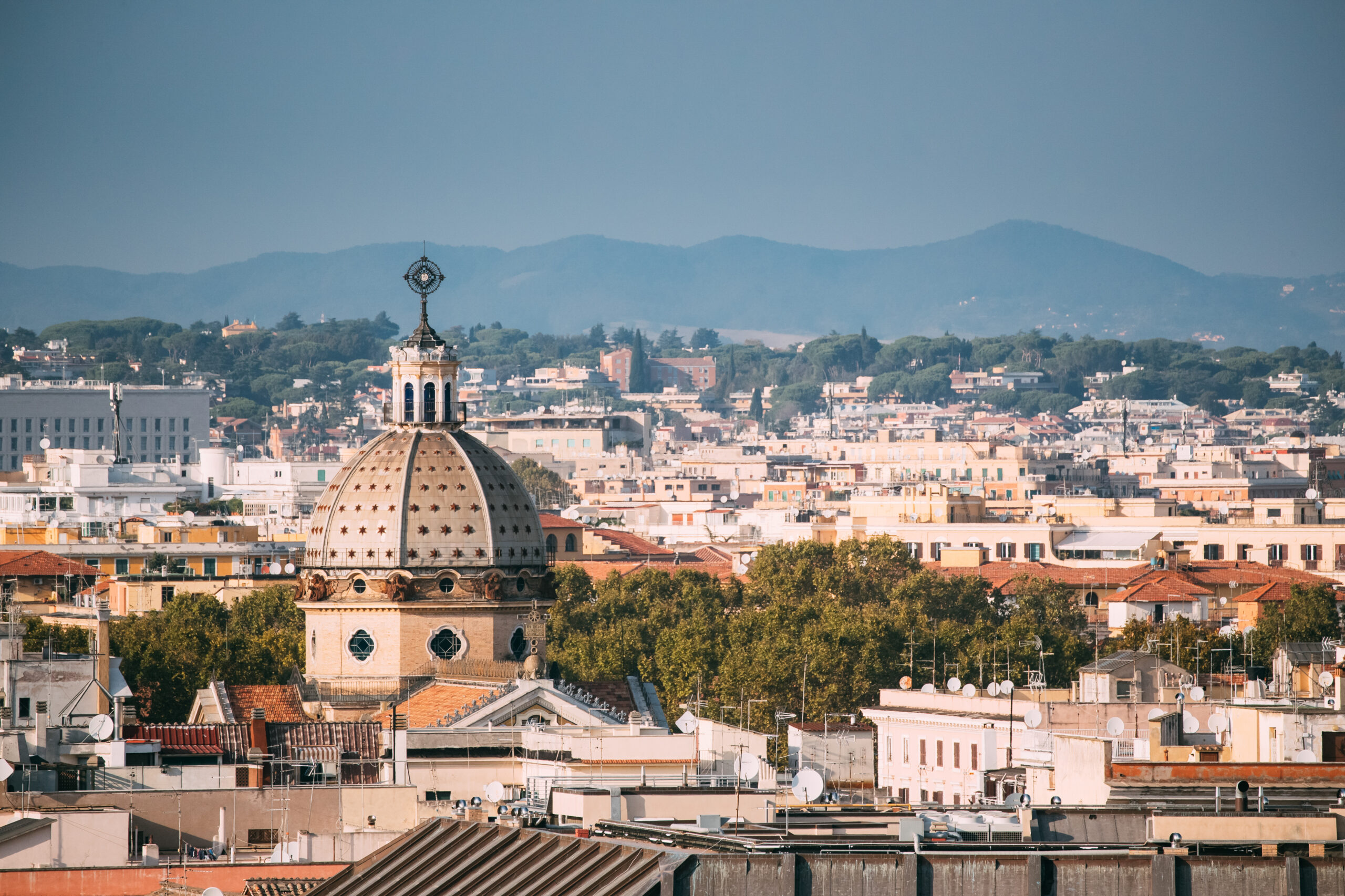 Rome, Italy. Cupola Of San Gioacchino Ai Prati Castello Church And Cityscape Of Town.