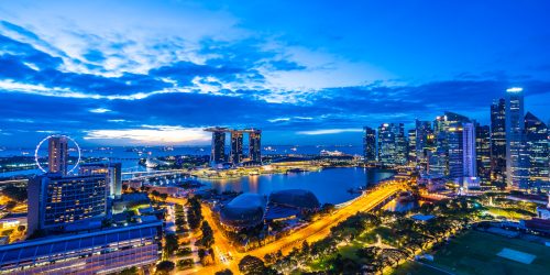 Beautiful architecture building exterior of singapore city skyline at twilight and night time